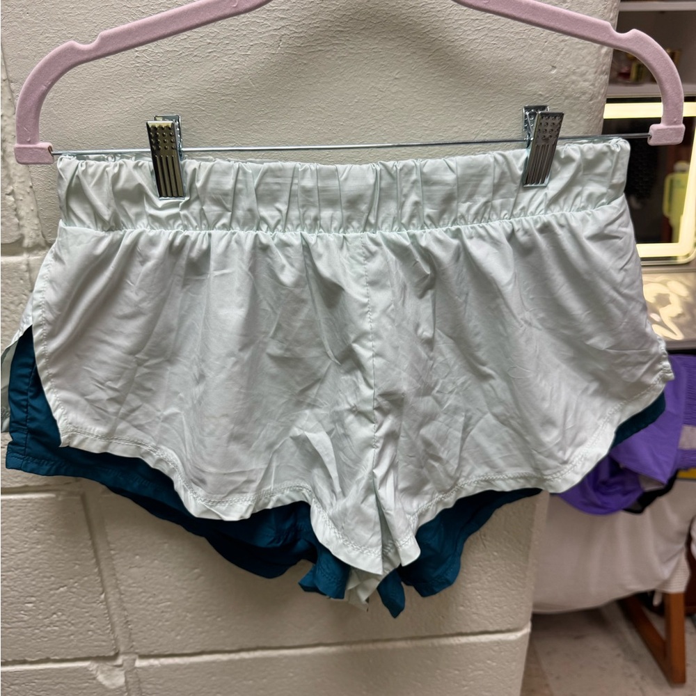 Double layered mint green and green free people movement shorts